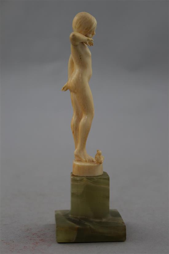 Attributed to Ferdinand Preiss, An Art Deco carved ivory figure of a young girl, 6in.